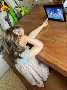 Girl using our online speech therapy service on a tablet